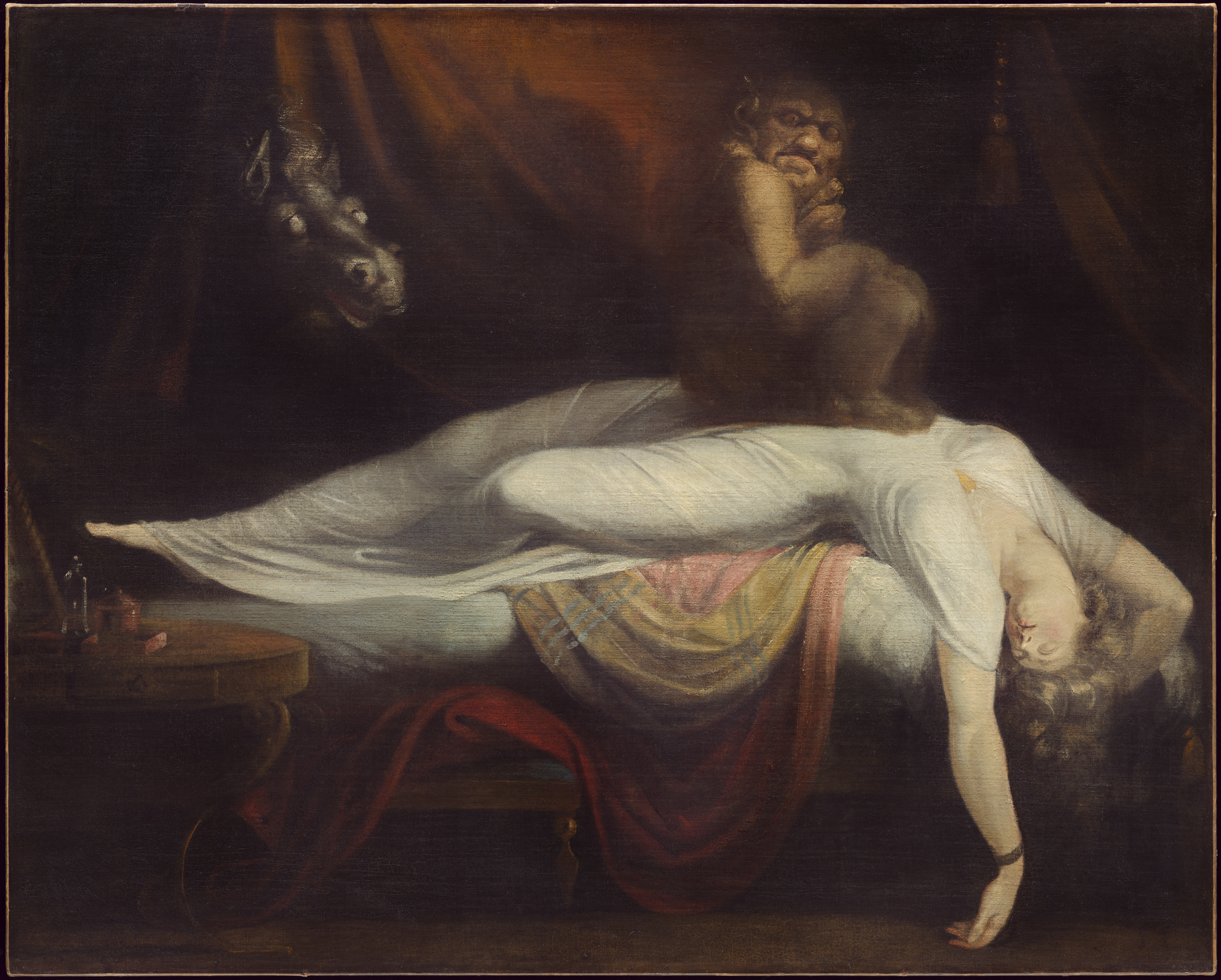 A sleeping woman lies across a bed as an uncanny figure watches over her