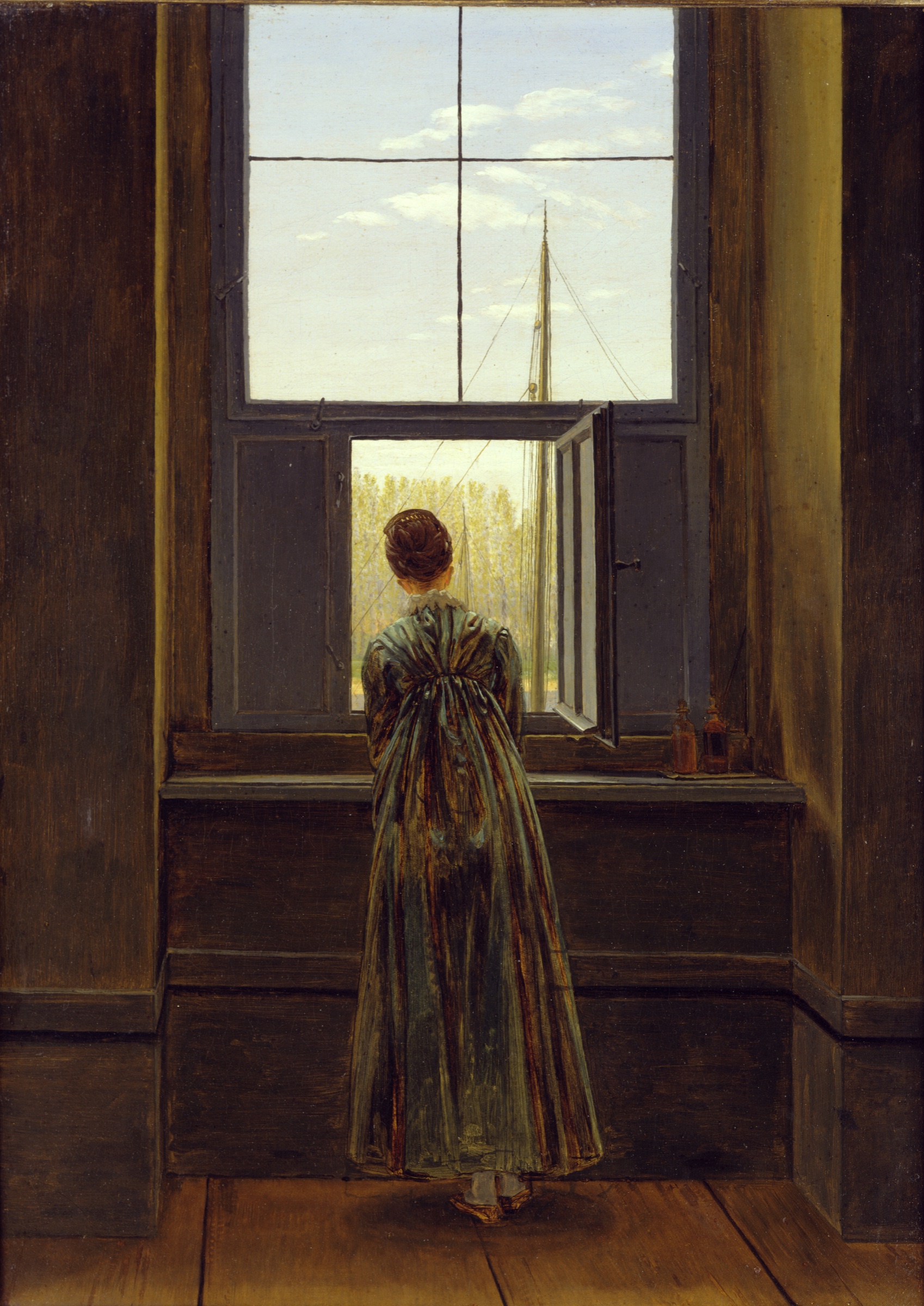 A woman seen from behind looking through an open window in Caspar David Friedrich’s Woman at a Window